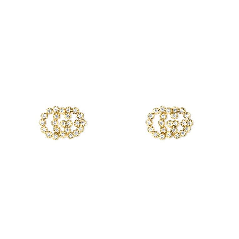 G*u*i earrings